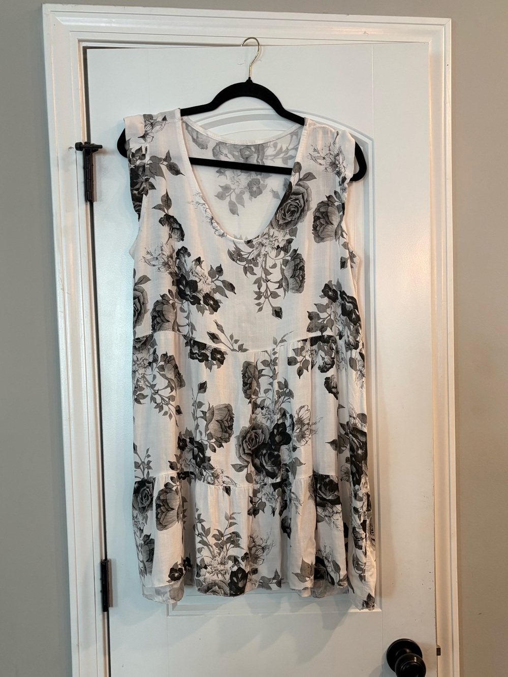 Sleeveless White Mini Dress with Black Floral Print